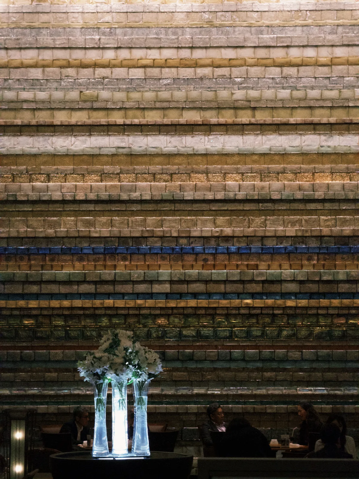 Glass bricks and white flowers